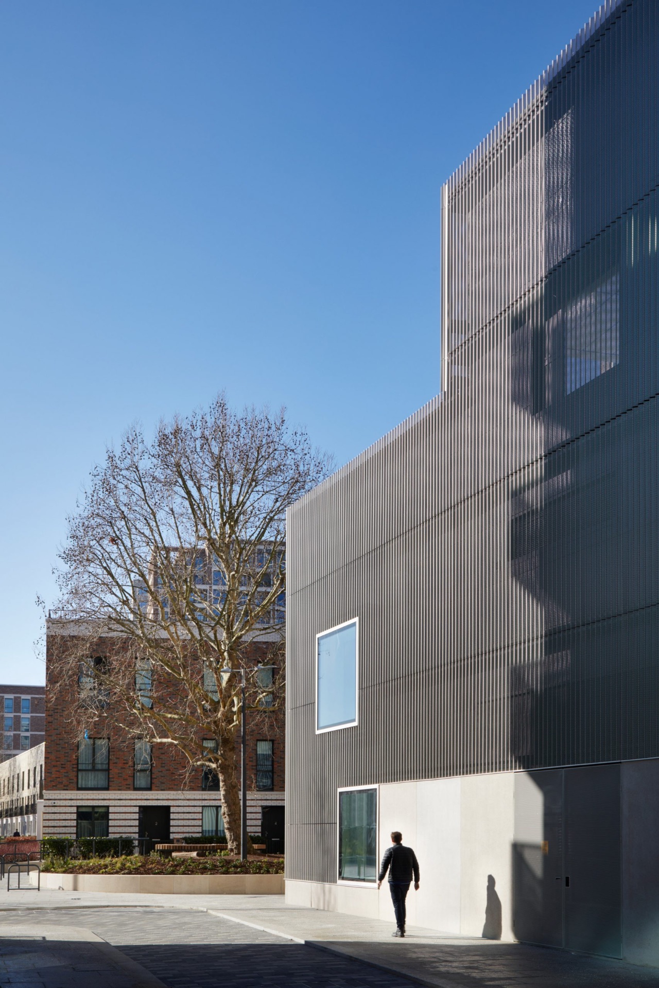 Modern Elephant and Castle building facade under blue sky